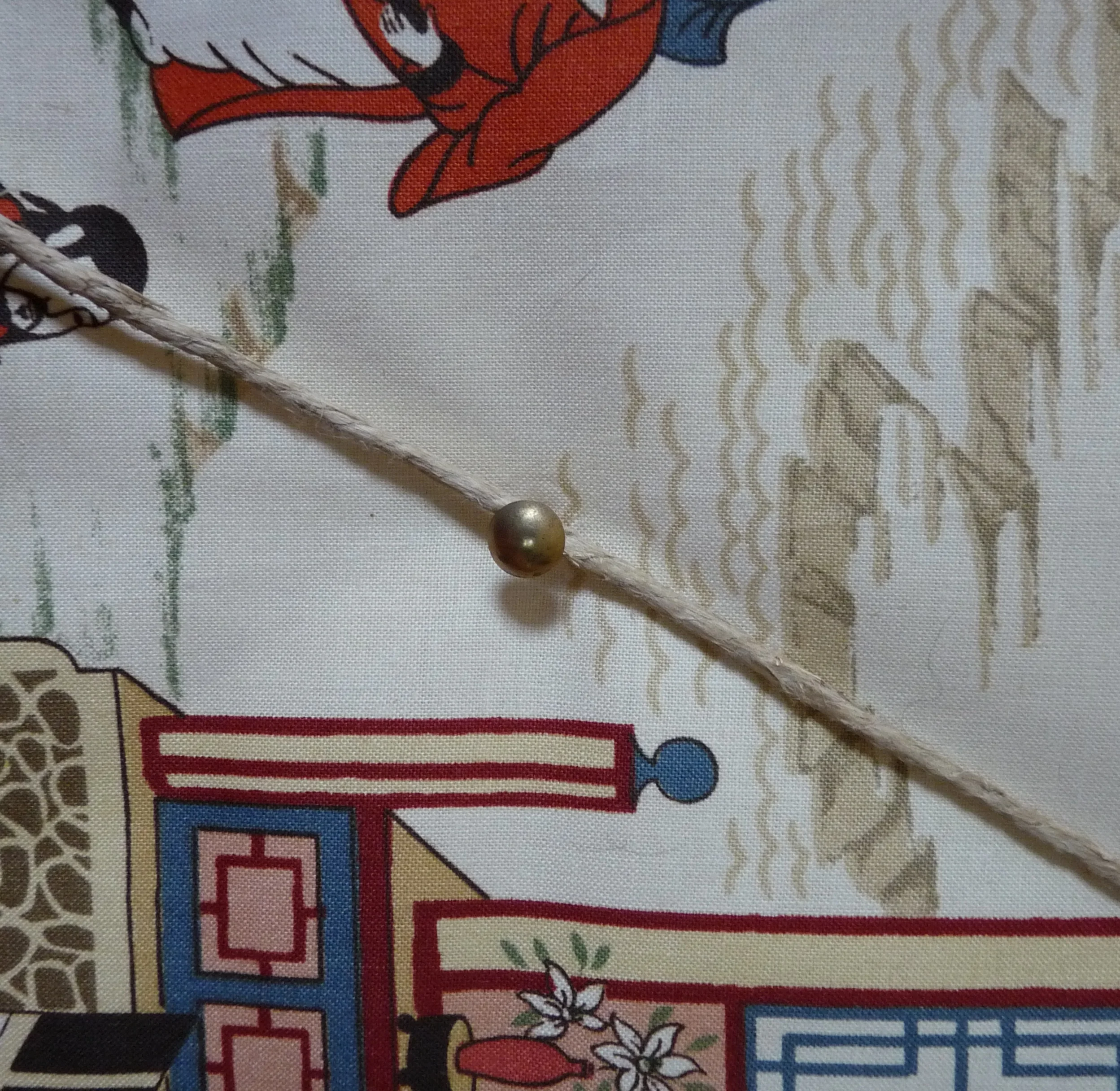 Putting laid cord on a pin board using discoverupholstery.co.uk supplies